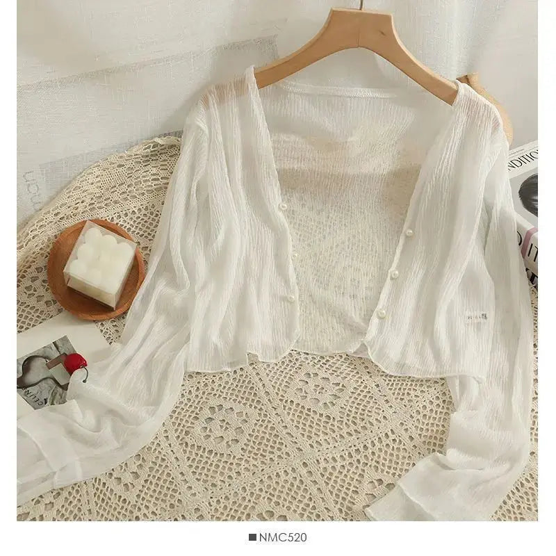 Summer Breeze Cardigan in a serene setting, reflecting its summer vibe.