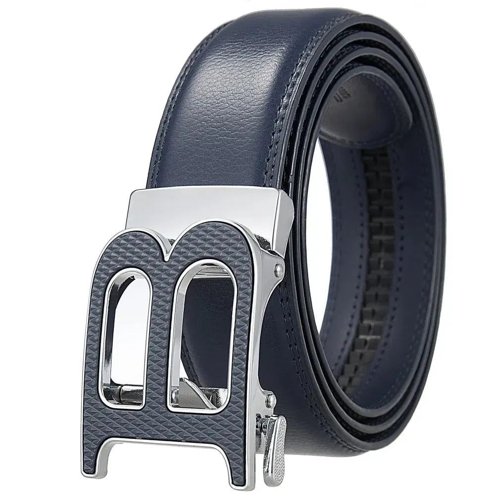 Detail shot of the metallic automatic buckle on the Command the Room leather belt, illustrating its locking mechanism.