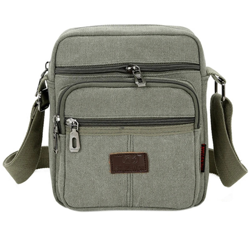 Timeless solid color crossbody bag in waterproof canvas with polyester-lined interior compartments