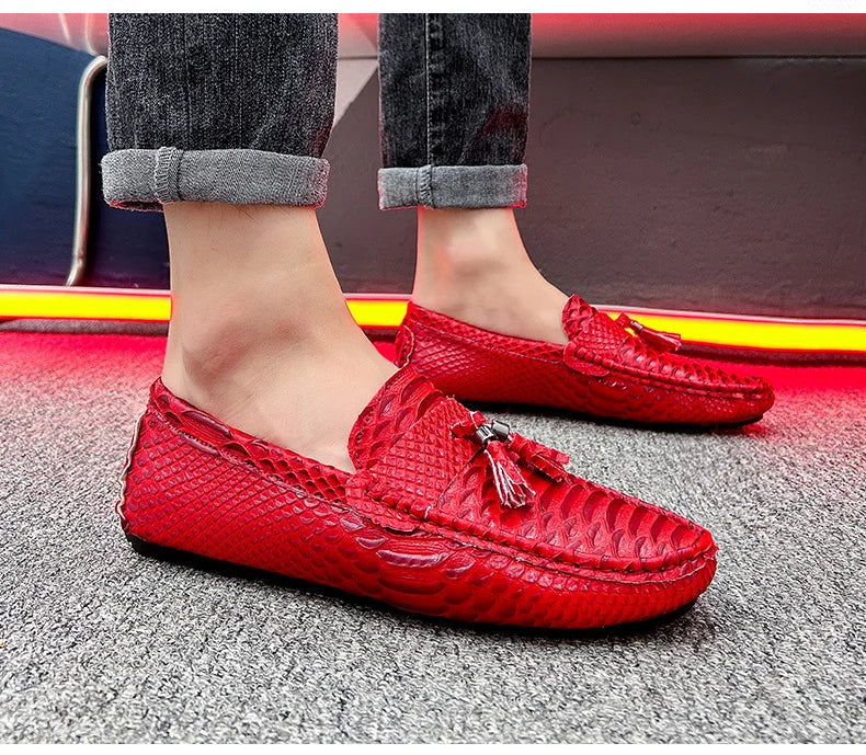 Pair of brown waterproof loafers with breathable perforated leather design