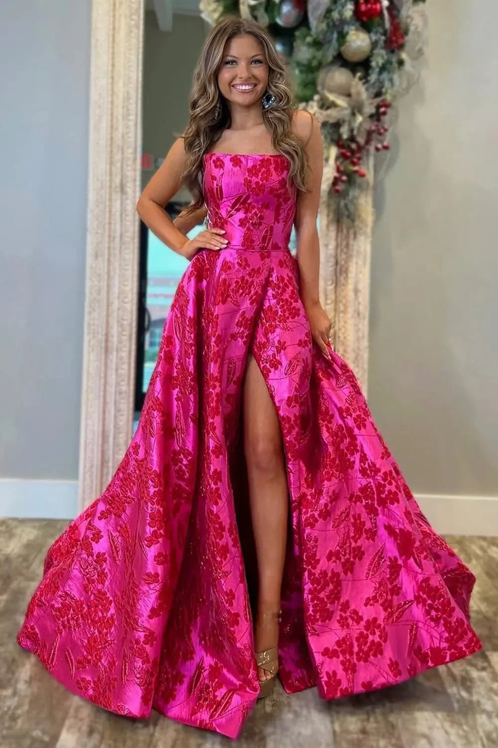 Model wearing the Fuchsia Flair Prom Dress, highlighting the flattering silhouette and elegant fit.