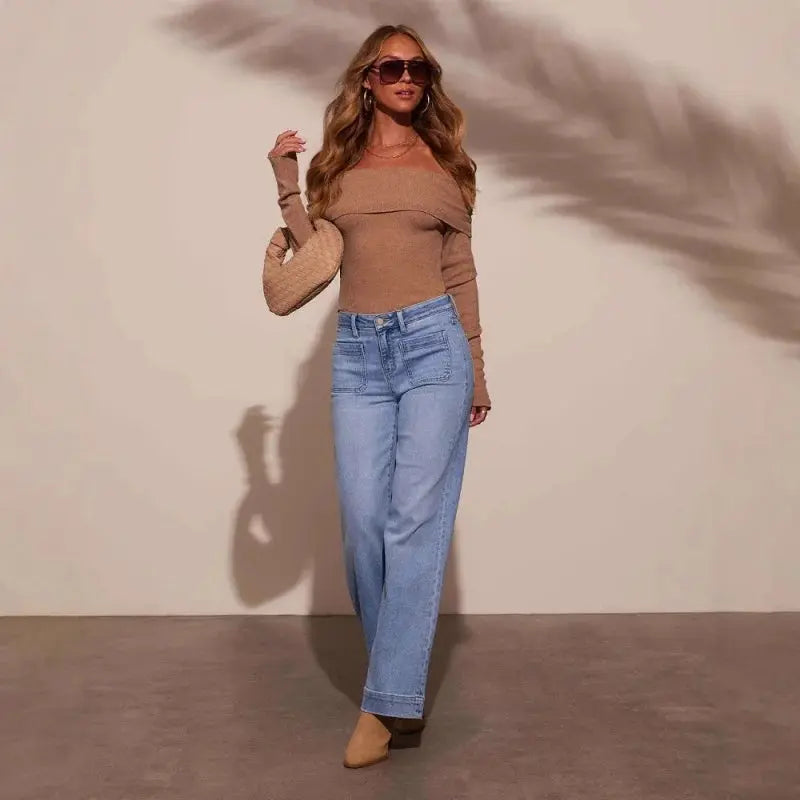 Back view of Retro Chic Jeans featuring practical pockets and a chic high-waisted design for everyday elegance.