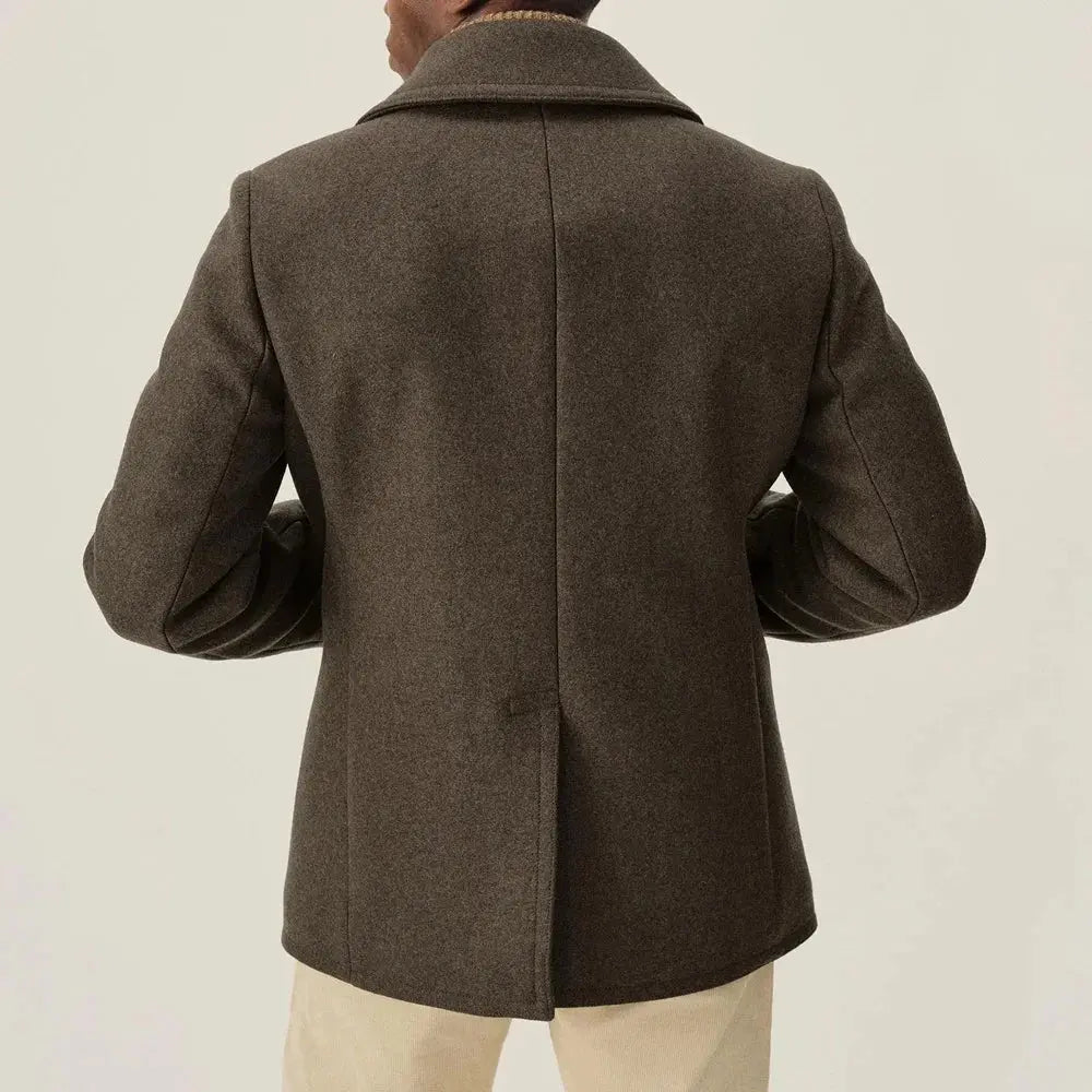 Close-up of the double-breasted buttons on the winter coat, showcasing elegant design.