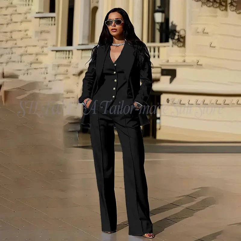 Model adjusting her blazer, exuding confidence.