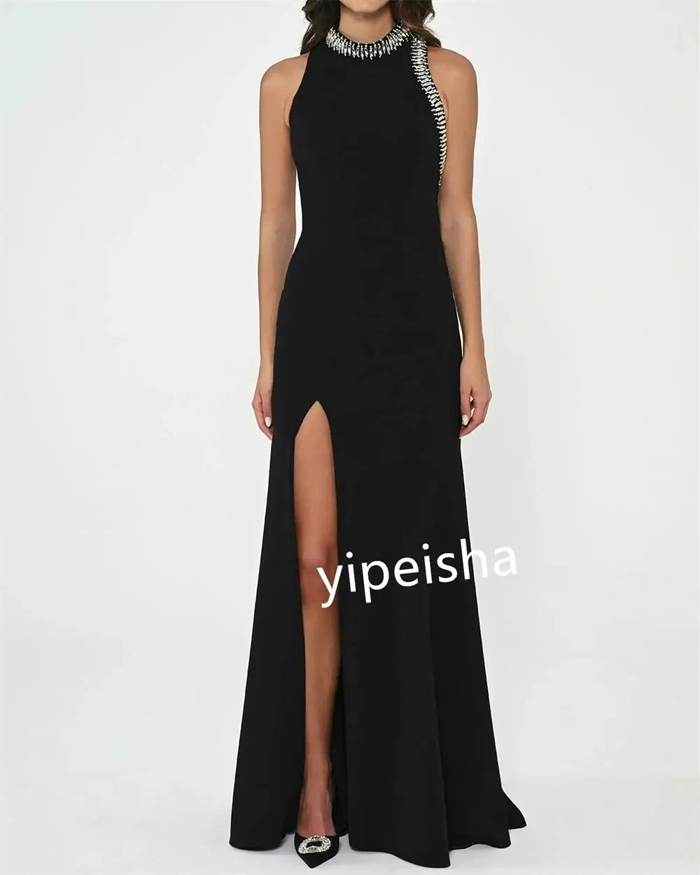 Model wearing the Captivate the Night gown, demonstrating its fluid drape and flattering silhouette.