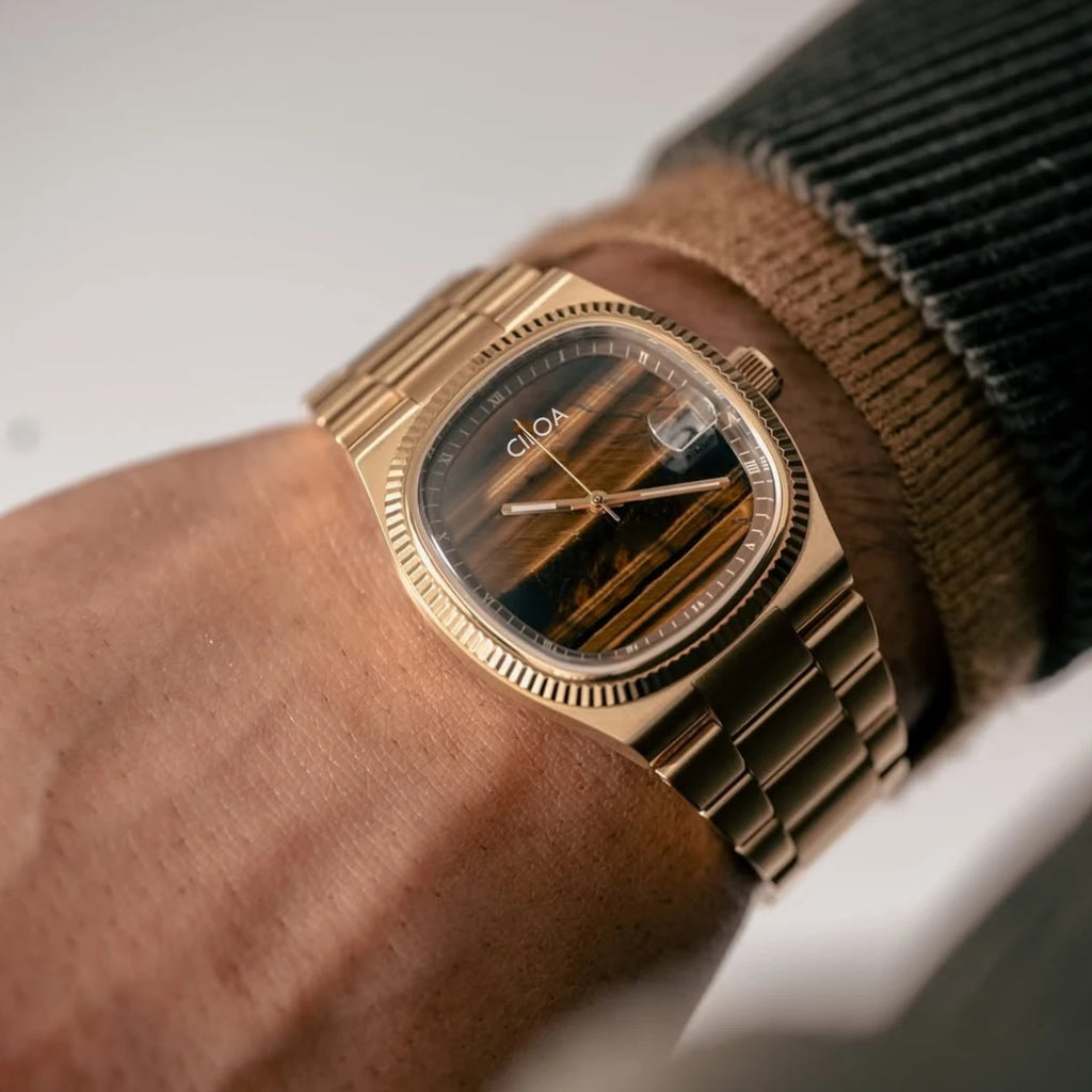 CILOA Quartz Watch with polished stainless steel and elegant square face.