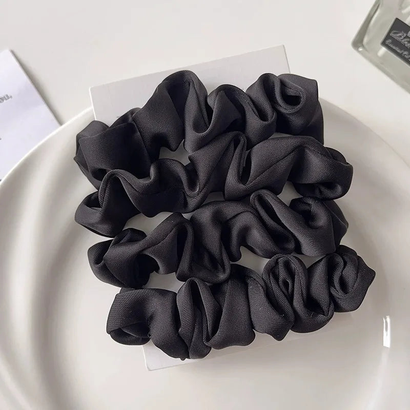 Gentle satin hair ties for crease-free ponytails and damage-free styling