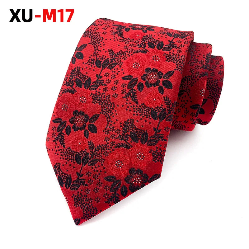 Purple jacquard tie draped elegantly over a suit jacket.