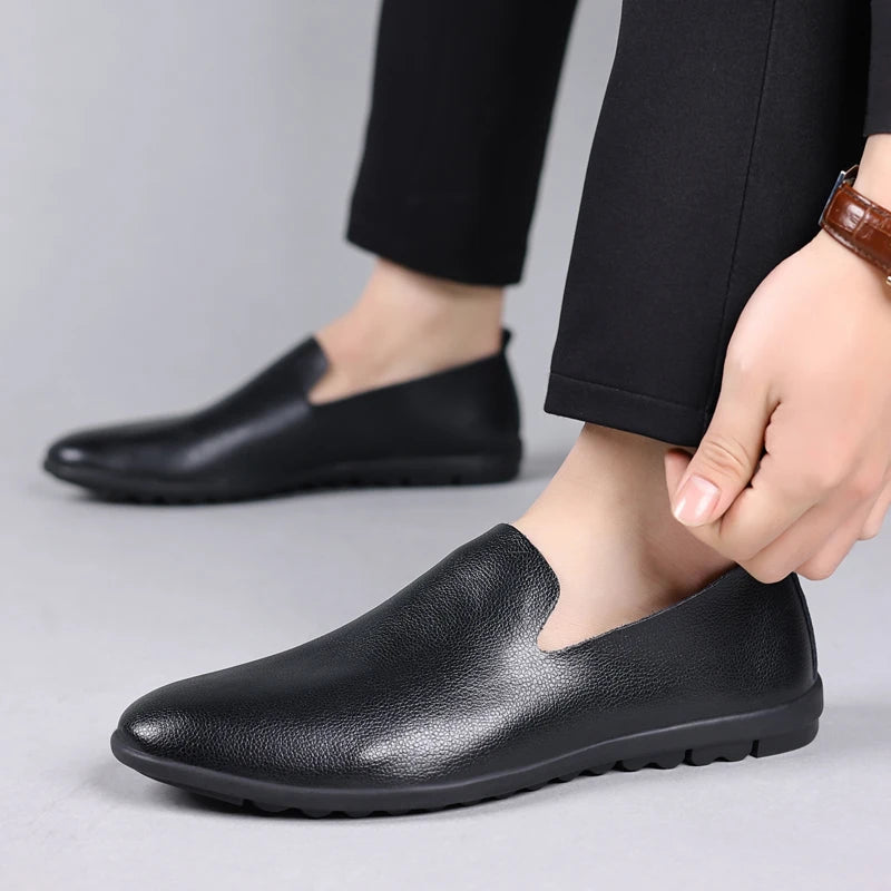Men's sleek city loafers in premium faux leather with subtle sheen.