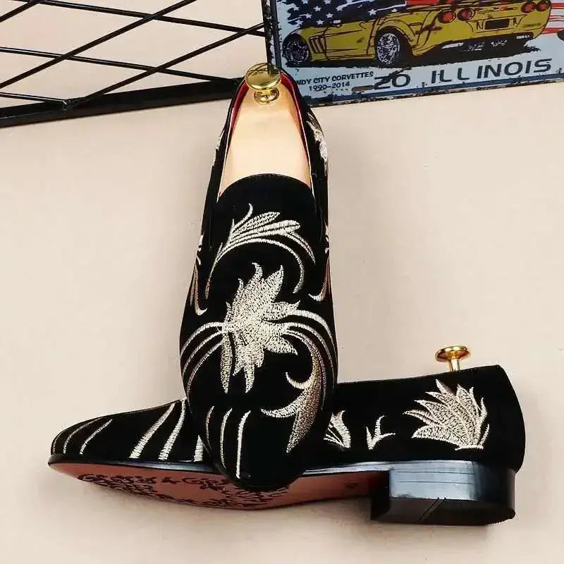 Whisper-Soft Suede Loafers displayed on a wooden surface, showcasing their premium quality and craftsmanship.
