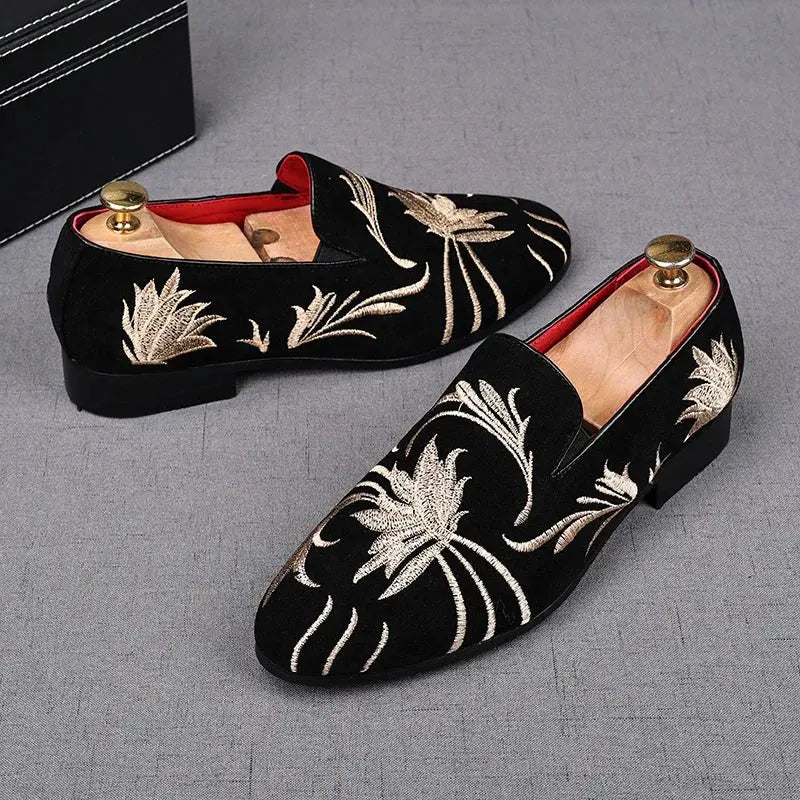 Close-up of embroidered detailing on Whisper-Soft Suede Loafers, highlighting luxury and elegance.