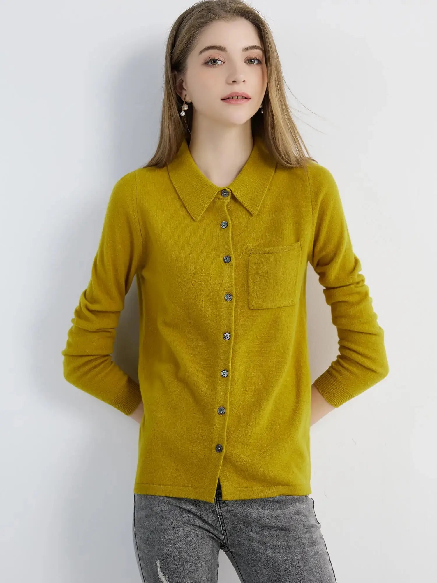 Image of the cardigan folded neatly, emphasizing its lightweight durability.
