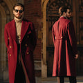 Double-breasted wool overcoat in neutral color, showcasing tailored fit and peaked lapels.