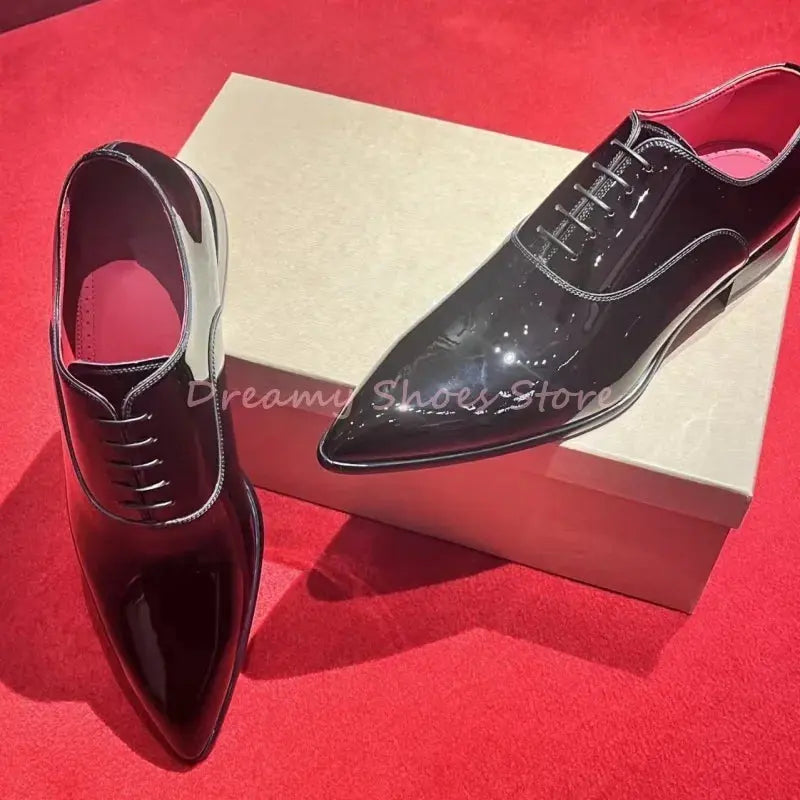 Close-up of polished patent leather Oxford shoe showcasing elegant design.