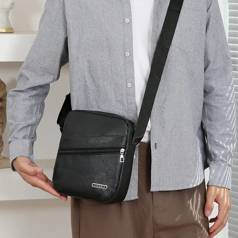 Durable nylon messenger bag worn crossbody style by urban commuter cycling through city streets