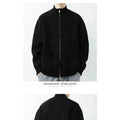 Versatile zip cardigan featuring a sleek silhouette, perfect layering piece for men's fall fashion.