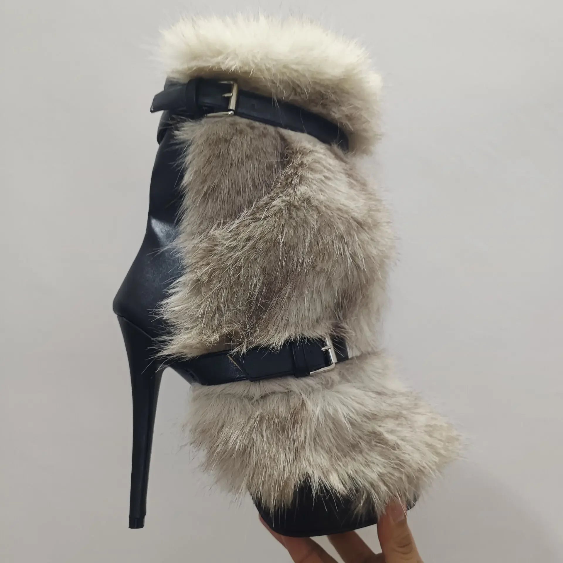 Bottom view of the durable rubber outsole of Midnight Whisper Ankle Boots for stability and style.