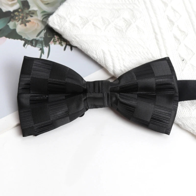 Charisma Bowtie styled with a suit, ideal for executive meetings and professional dress.
