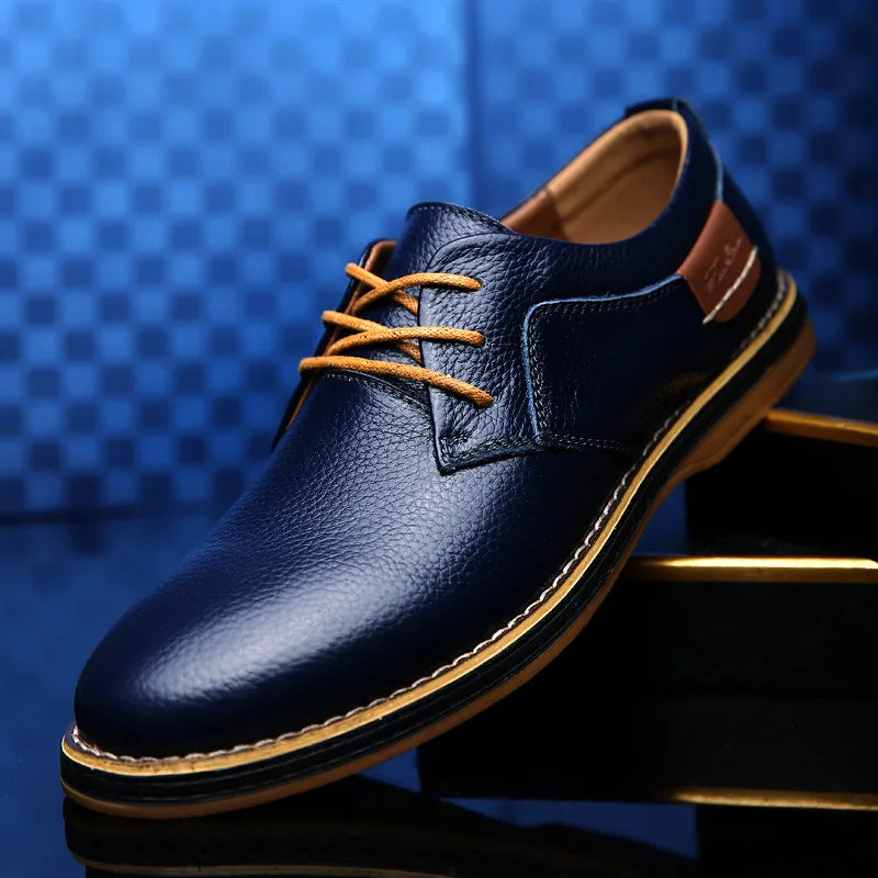 Side view of leather oxfords highlighting the classic brogue design.