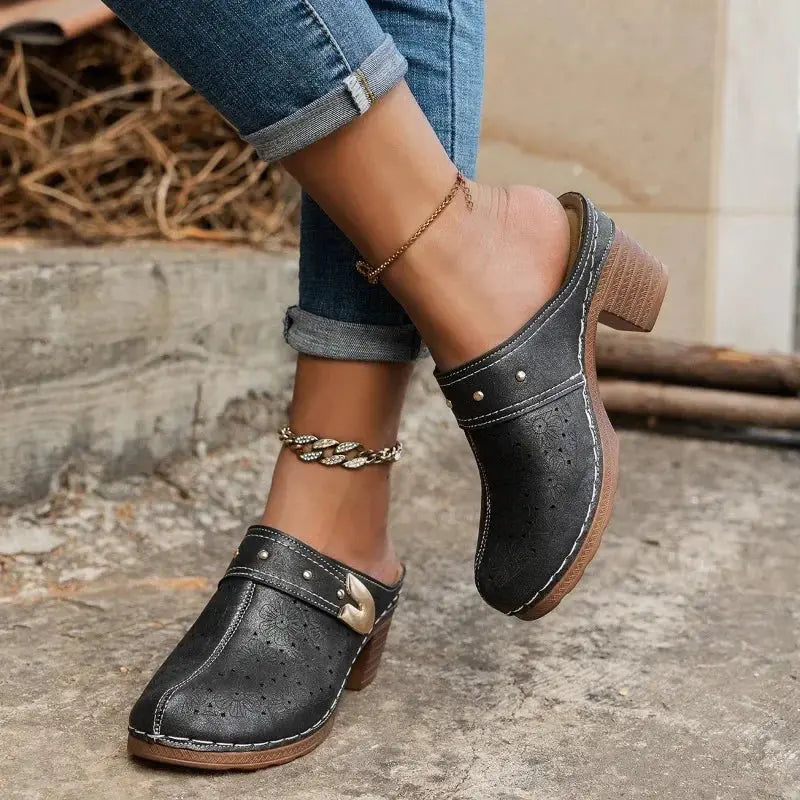 Handmade women's dress shoes featuring a durable rubber outsole for stability.