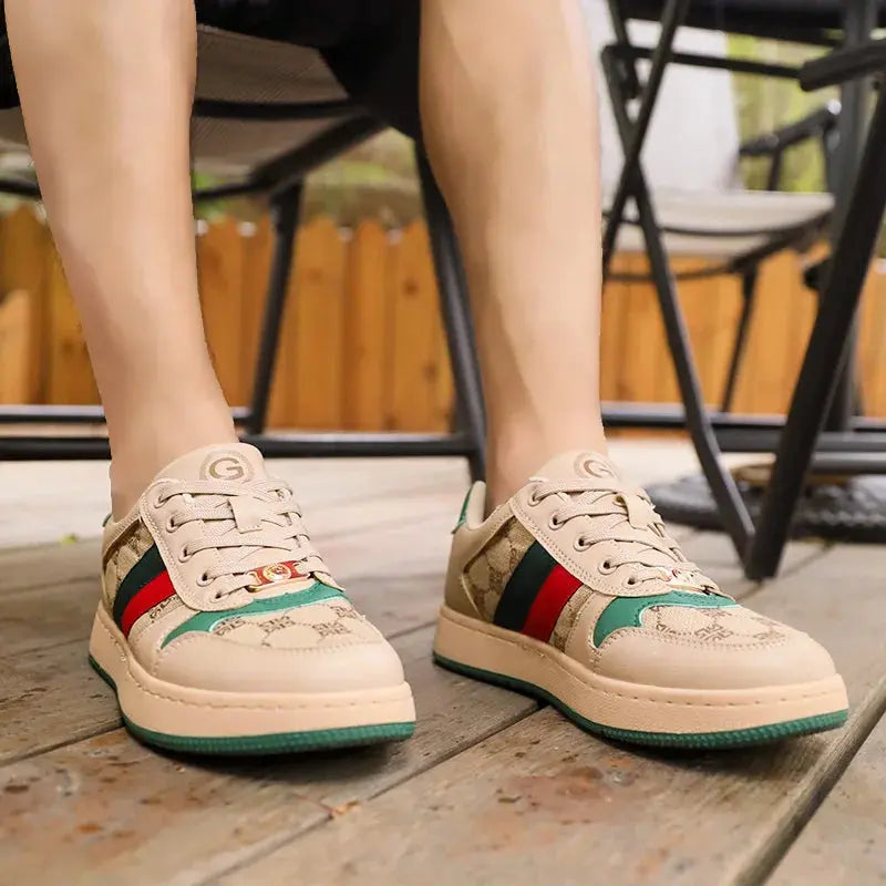 Side view of Glide With Style sneakers highlighting classic retro design and breathable fabric.