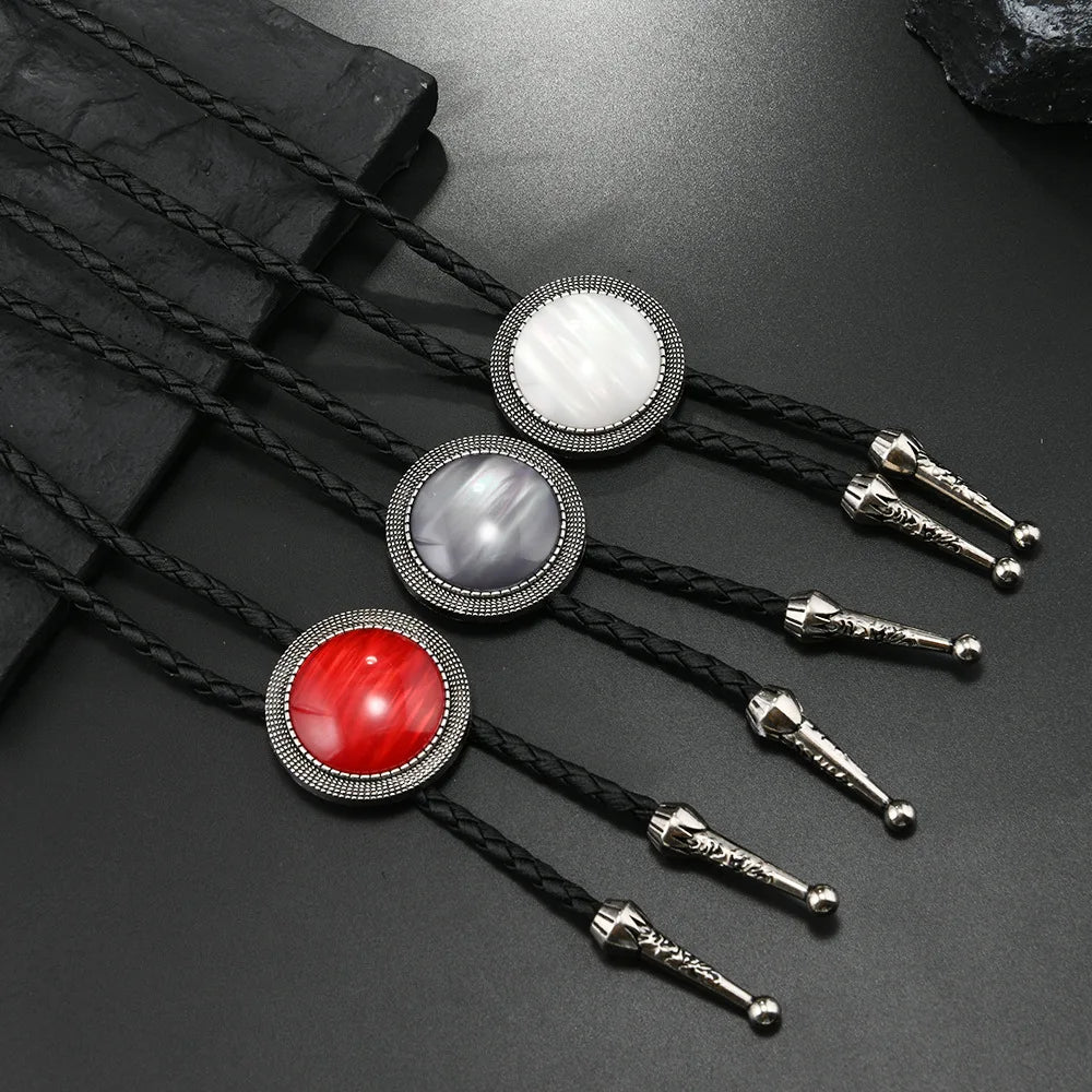 Western-inspired bolo tie with geometric patterns and faux fur texture.