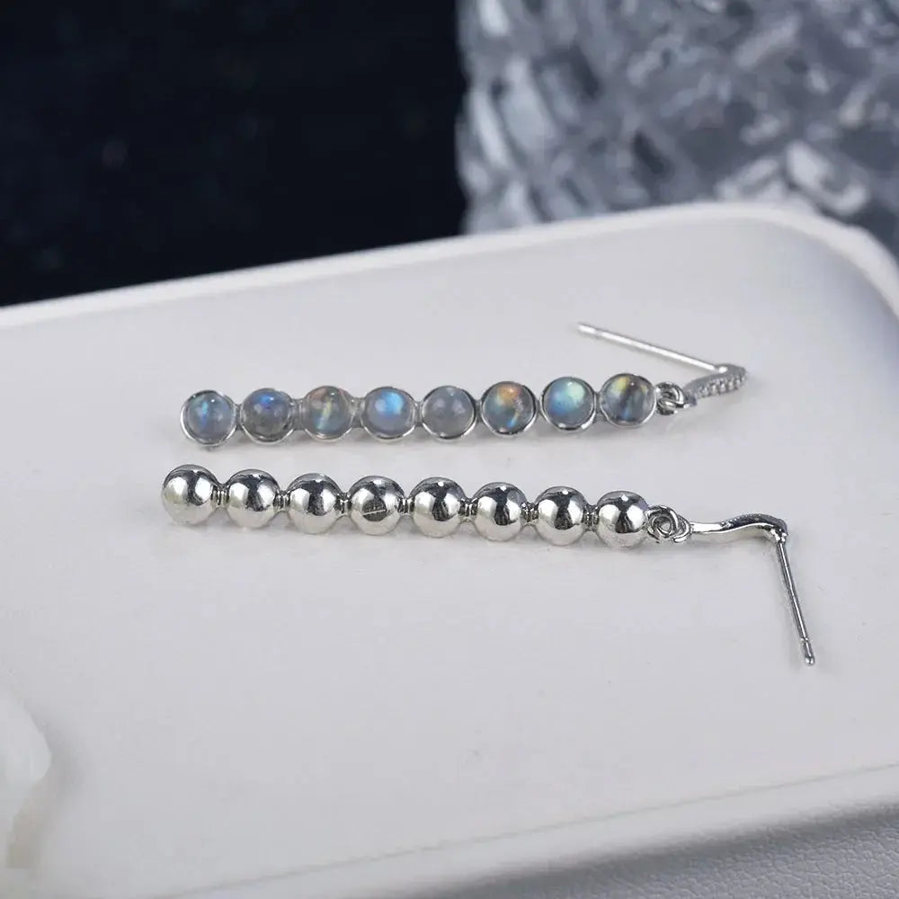 Geometric drop design of Celestial Glow Labradorite Earrings highlighting their unique shape and color.