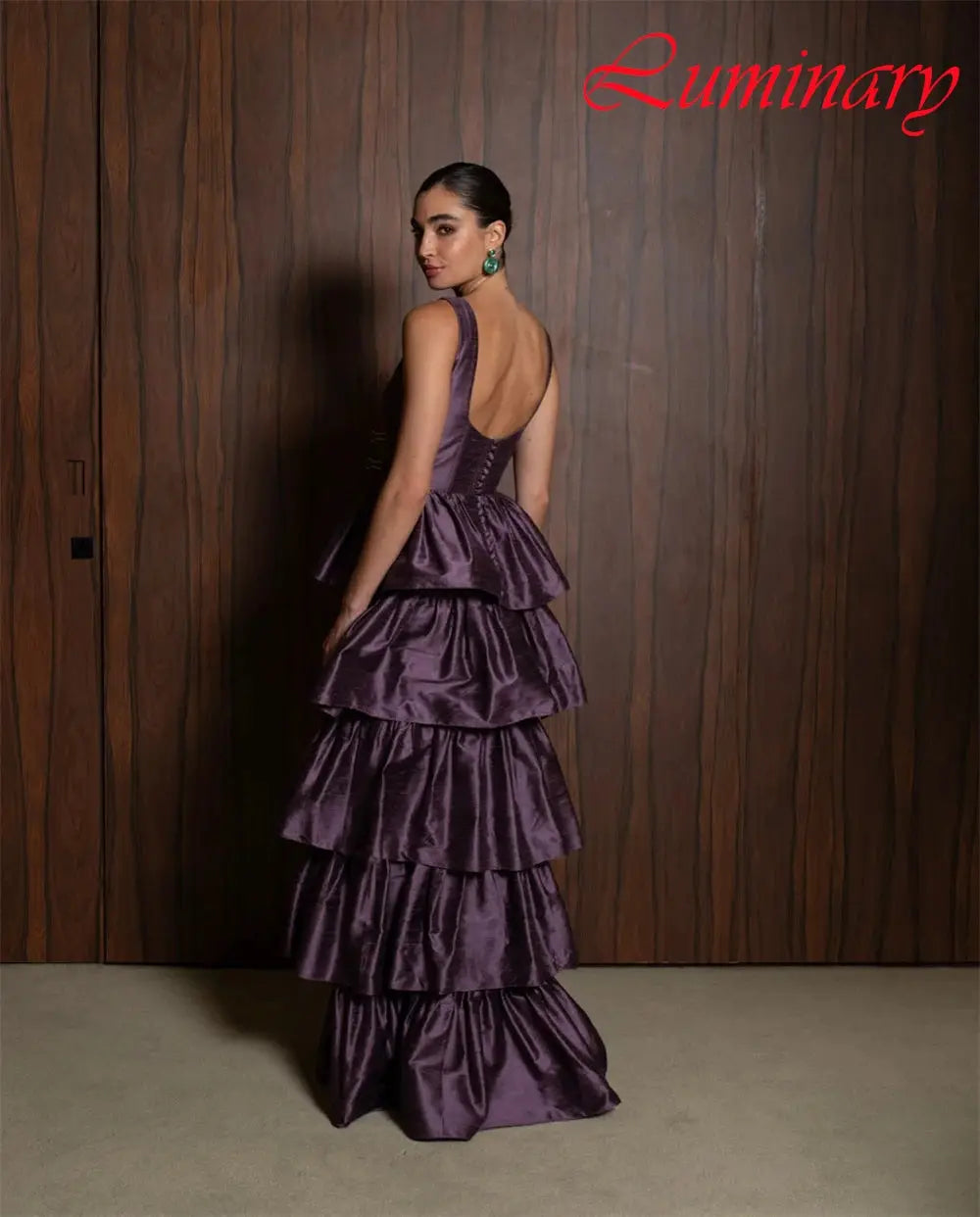Detail shot of the premium satin fabric of the evening dress, emphasizing its breathable luxury.