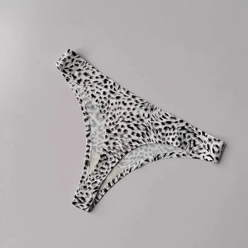 Detailed view of the thong's stitching, emphasizing its seamless construction.