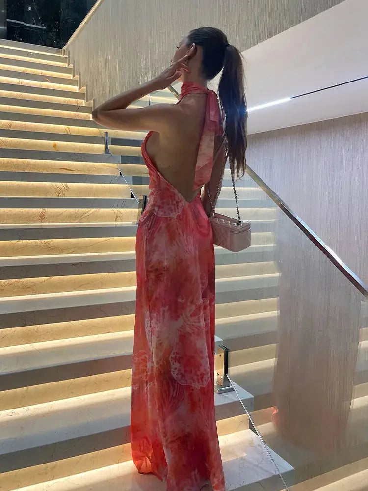 Sleek bodycon dress featuring elegant halter neckline and daring backless cut for evening wear