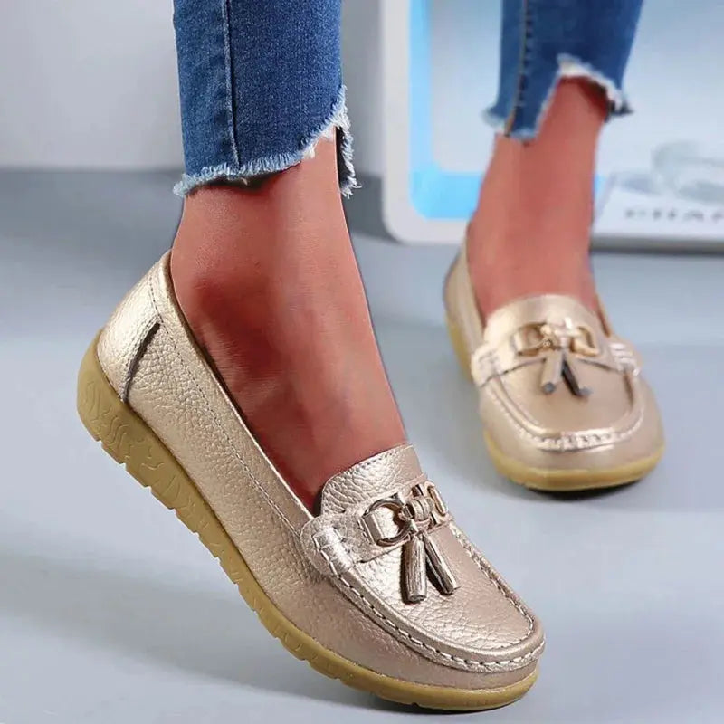 Durable white slip-on sneakers ideal for daily wear and summer outings.