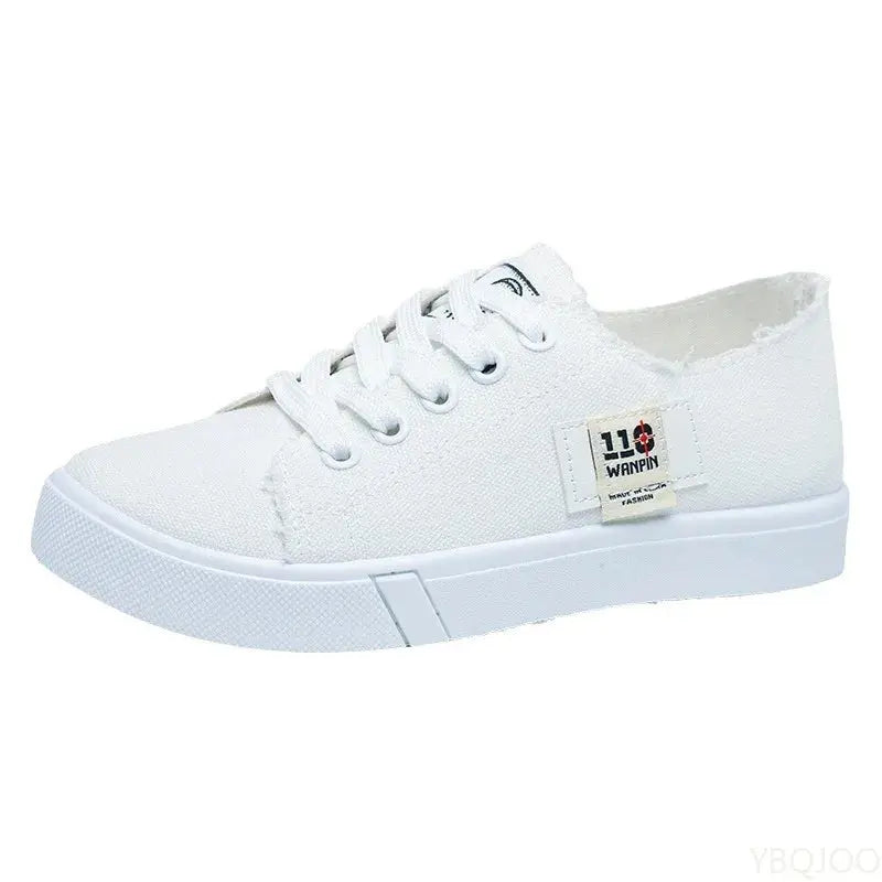 Top-down view of lace-up canvas sneakers, showcasing lightweight design.