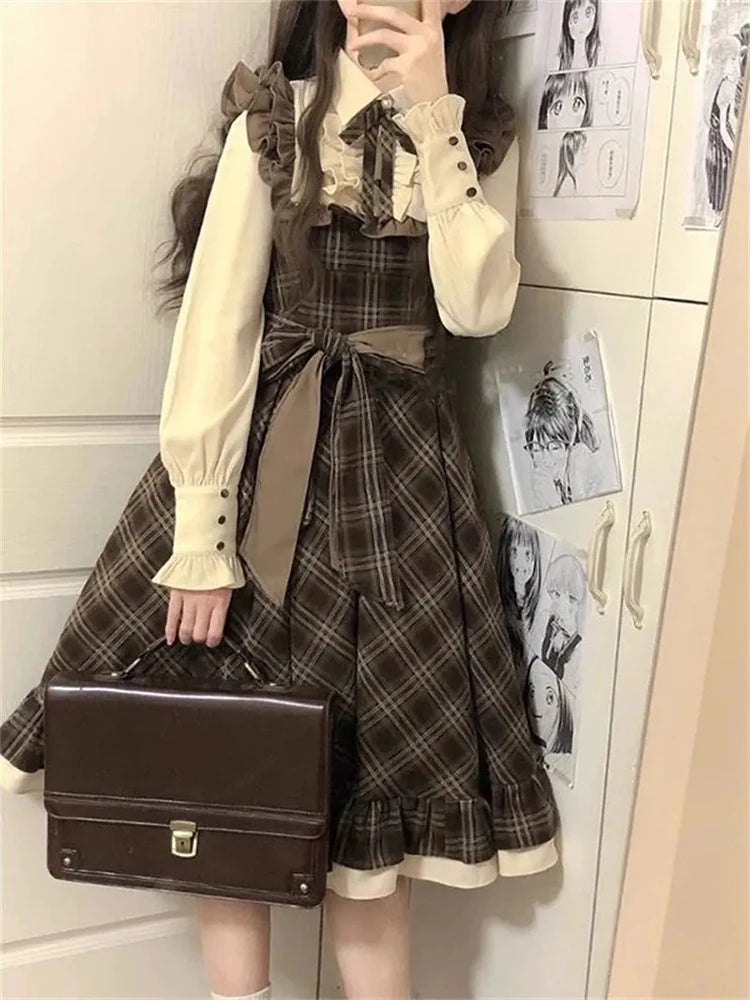 Autumn Whisper ruffle midi dress in plaid with structured polo neckline and bow detail.