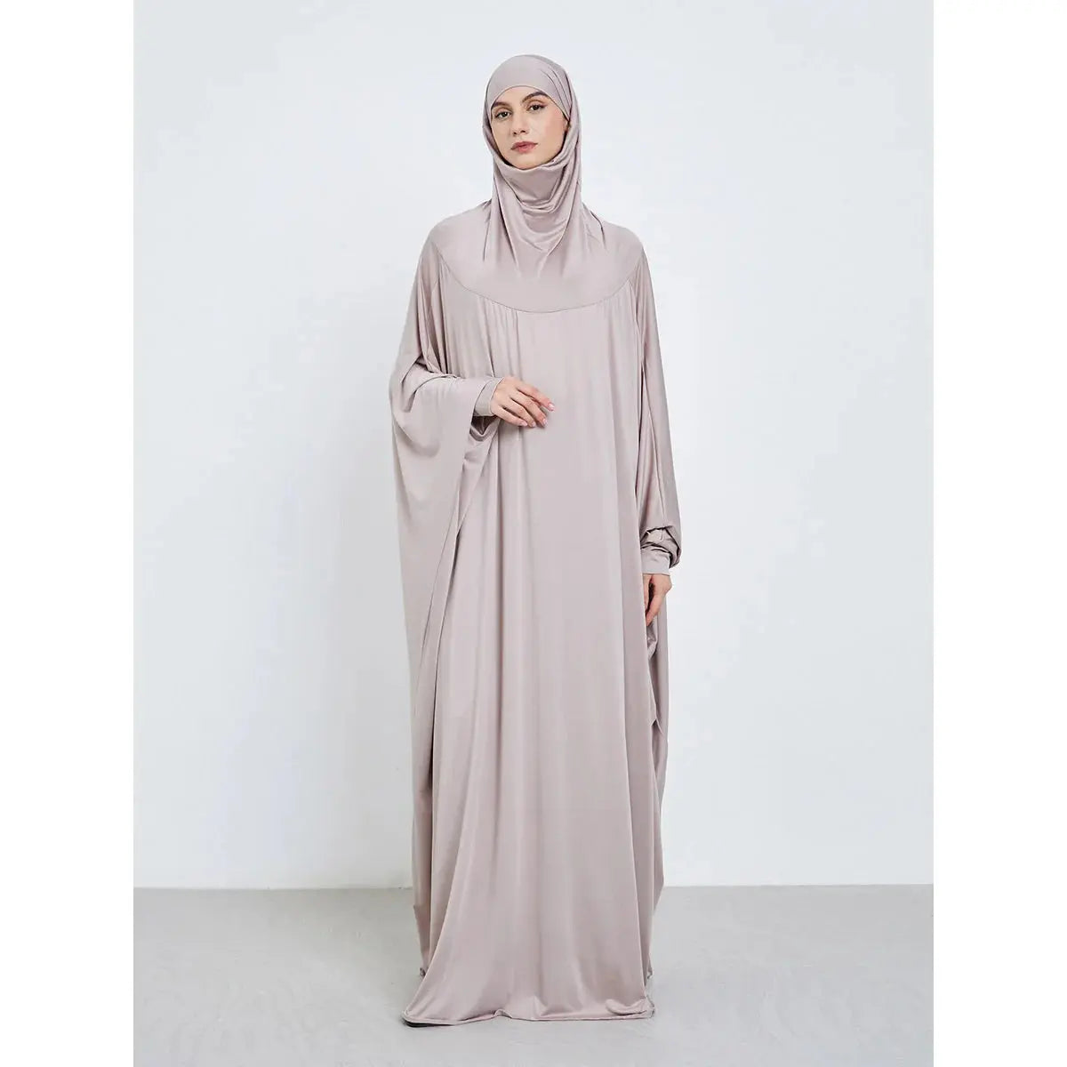 Elegant black Serene Grace Abaya with hood for modesty and comfort.