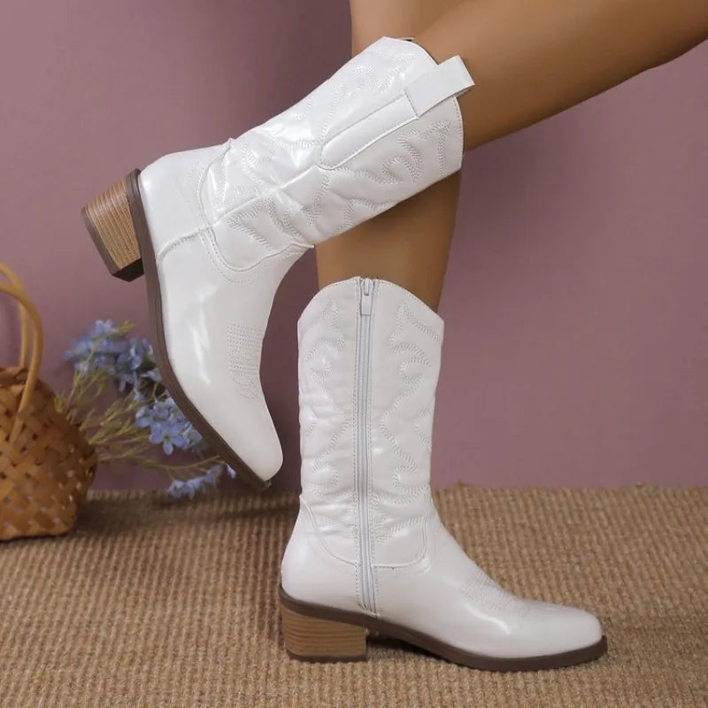 Tan leather cowboy boots with detailed embroidery and cushioned EVA insole for all-day comfort