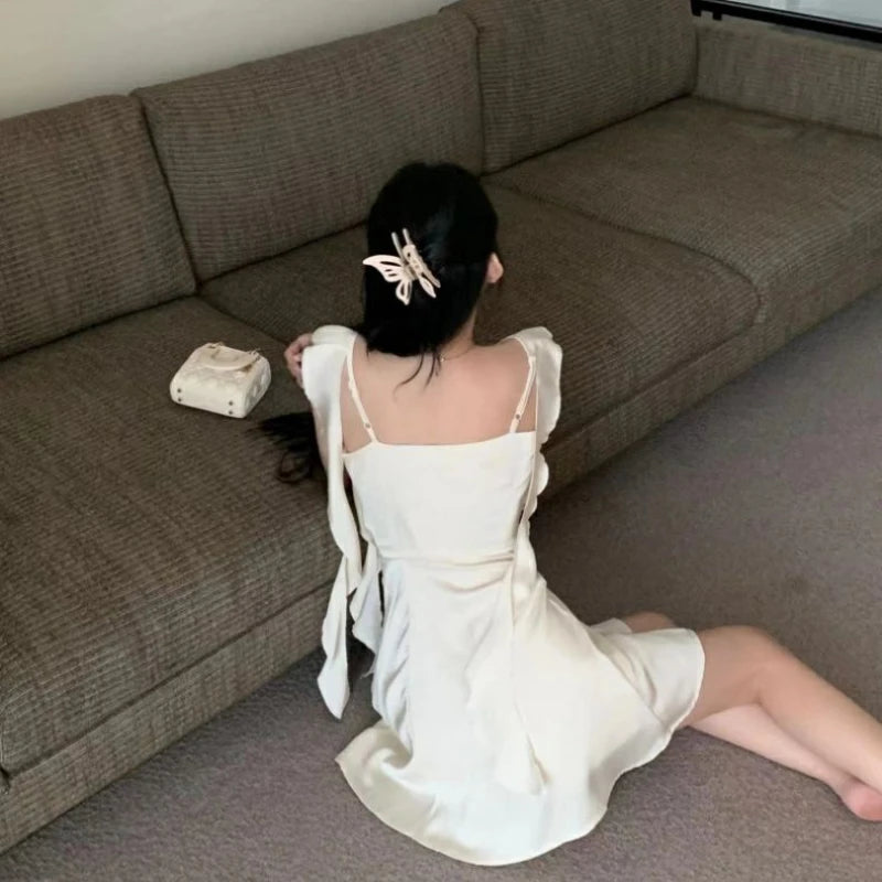 Back view of Apricot Whisper dress highlighting the subtle zip closure.