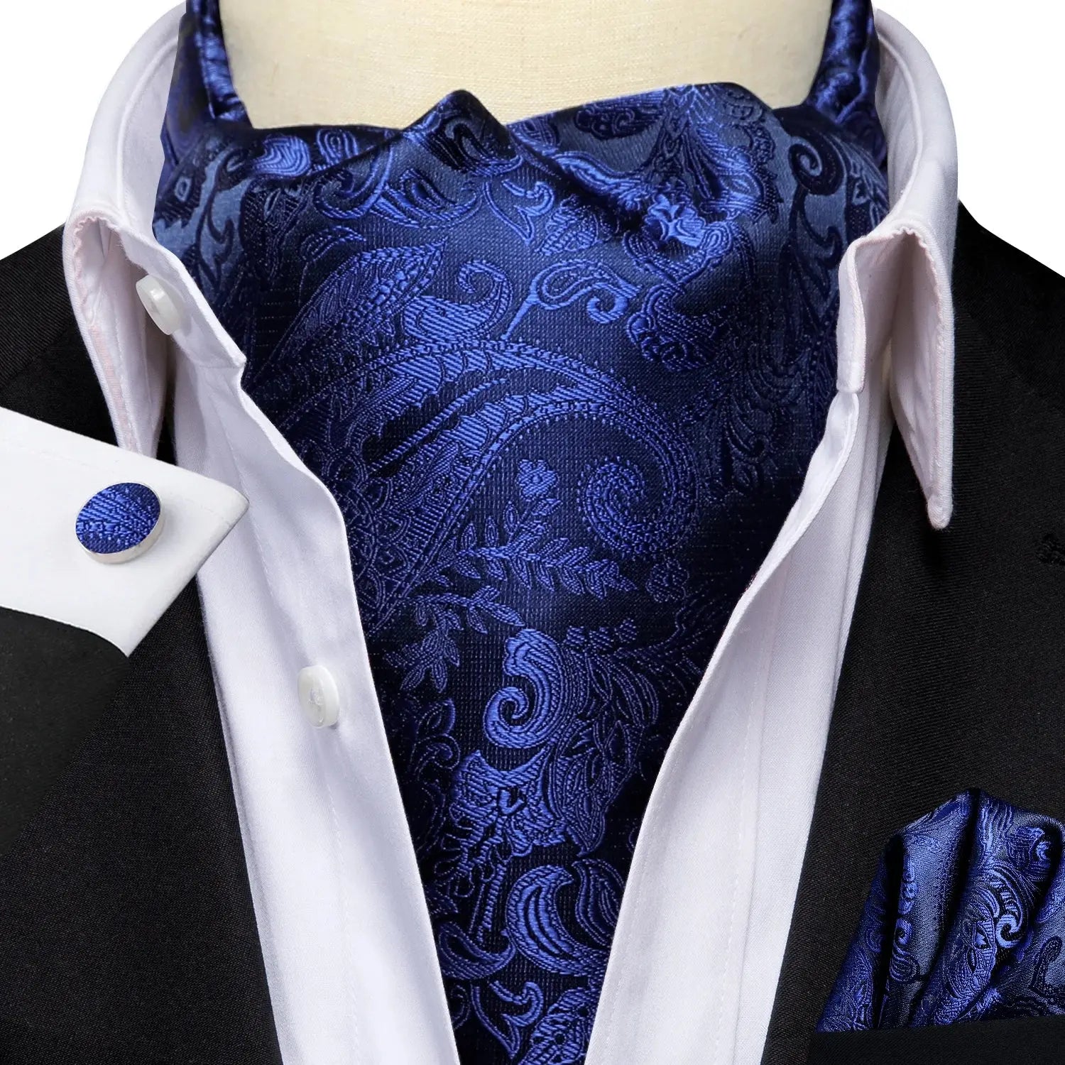 Silk blend ascot tie, ensuring crisp appearance throughout the day.