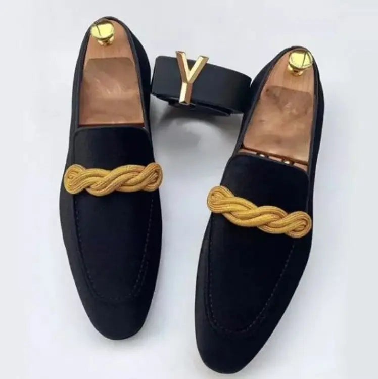 Full view of fringe loafers, combining luxury and playful design.