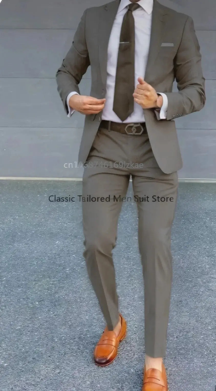 Back view of the tailored suit, showcasing its elegant silhouette and fit.