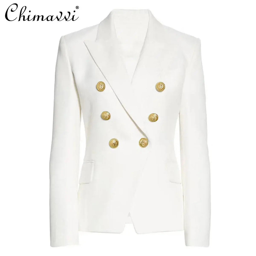 Detail of the sharp A-line skirt paired with the navy tailored jacket.