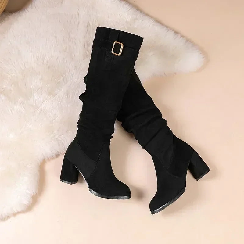 Waterproof suede slip-on boots with lined interior for all-day comfort