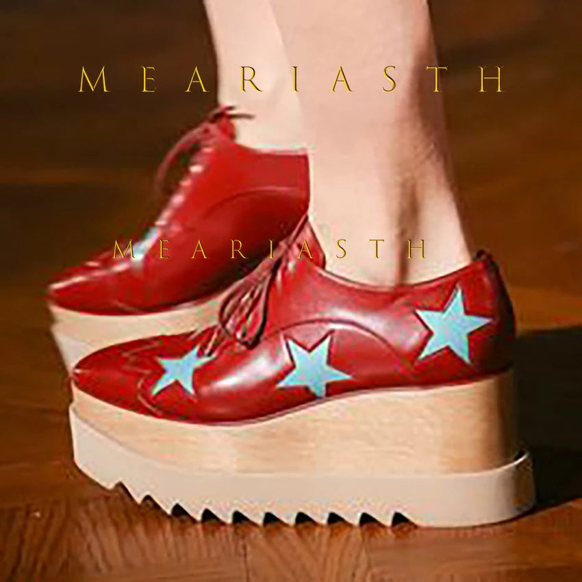 Side angle of leather platform sneakers showing wedge height and sleek design