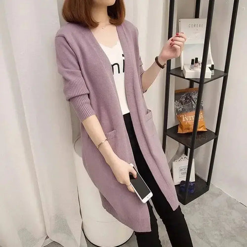 Cozy Autumn Whisper Cardigan with deep pockets, perfect for casual outings.