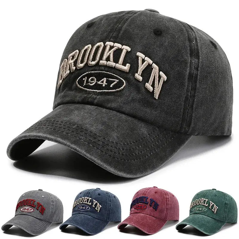 Vintage Vibes Cap in faded blue cotton with subtle letter embroidery.