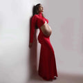 Radiant Glow Maternity Gown in soft voile, featuring a sweetheart neckline and flowing floor-length design.