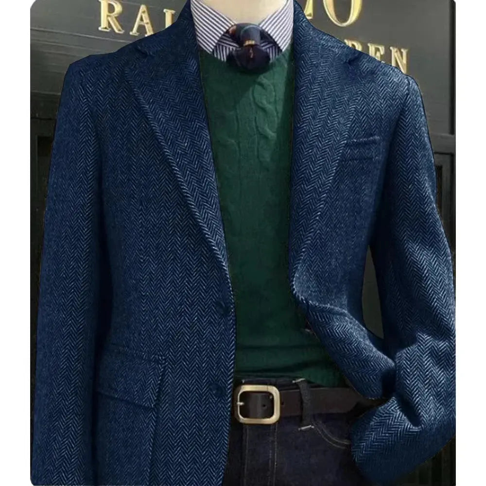 Close-up of herringbone pattern on a men's blazer, showcasing its classic design.