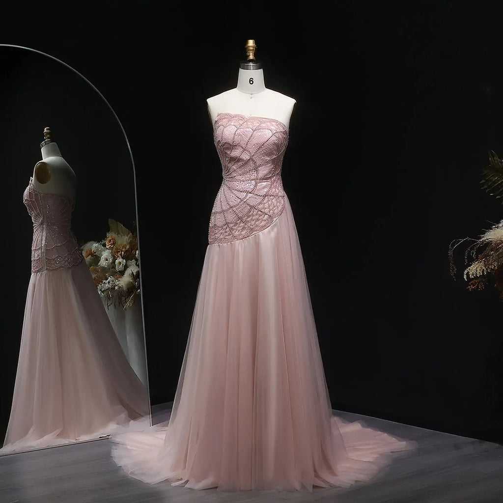 Comfortable strapless gown featuring a built-in bra and structured bodice.