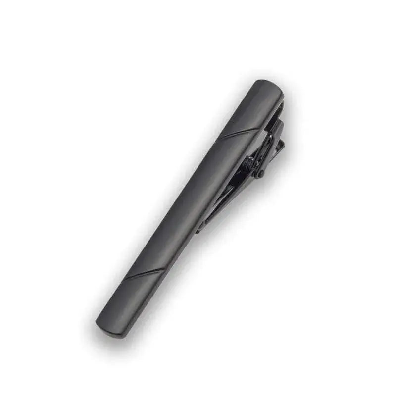 Professional wardrobe essential: sleek tie clip adding elegance to office attire.