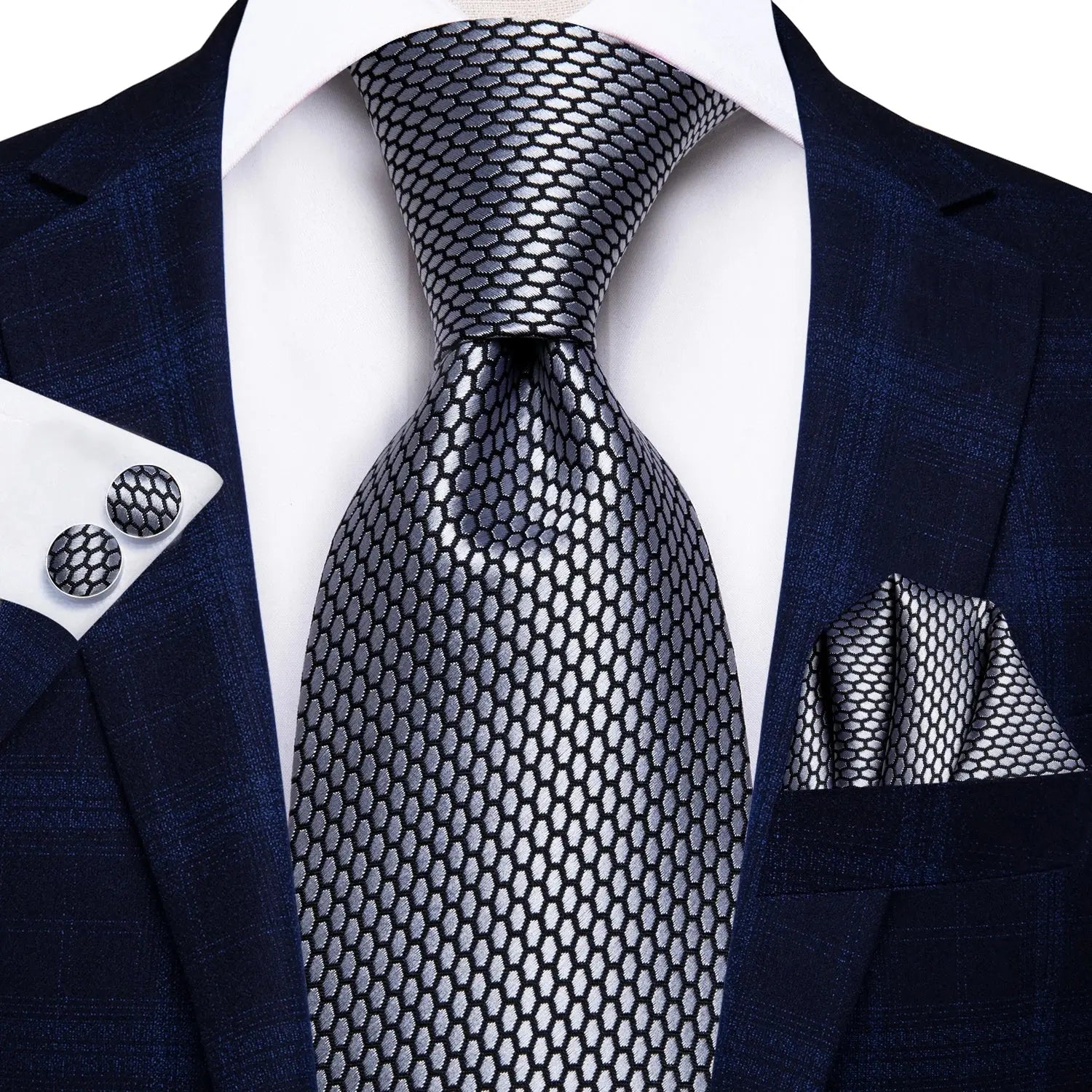 High-quality silk tie with matching accessories for men.