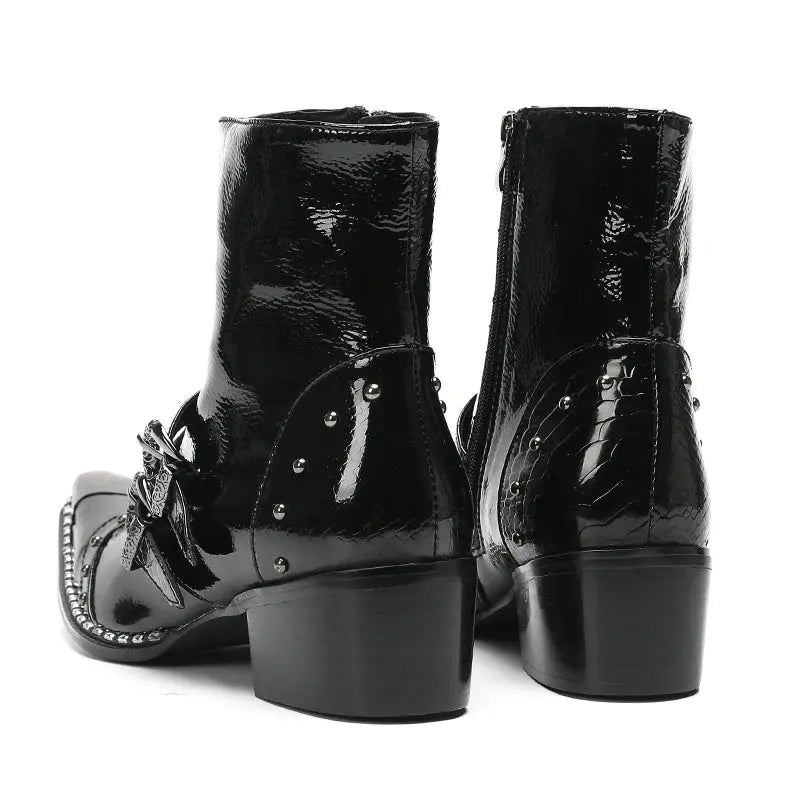 Handmade ankle boots in rich brown leather with decorative metal buckles and edgy design